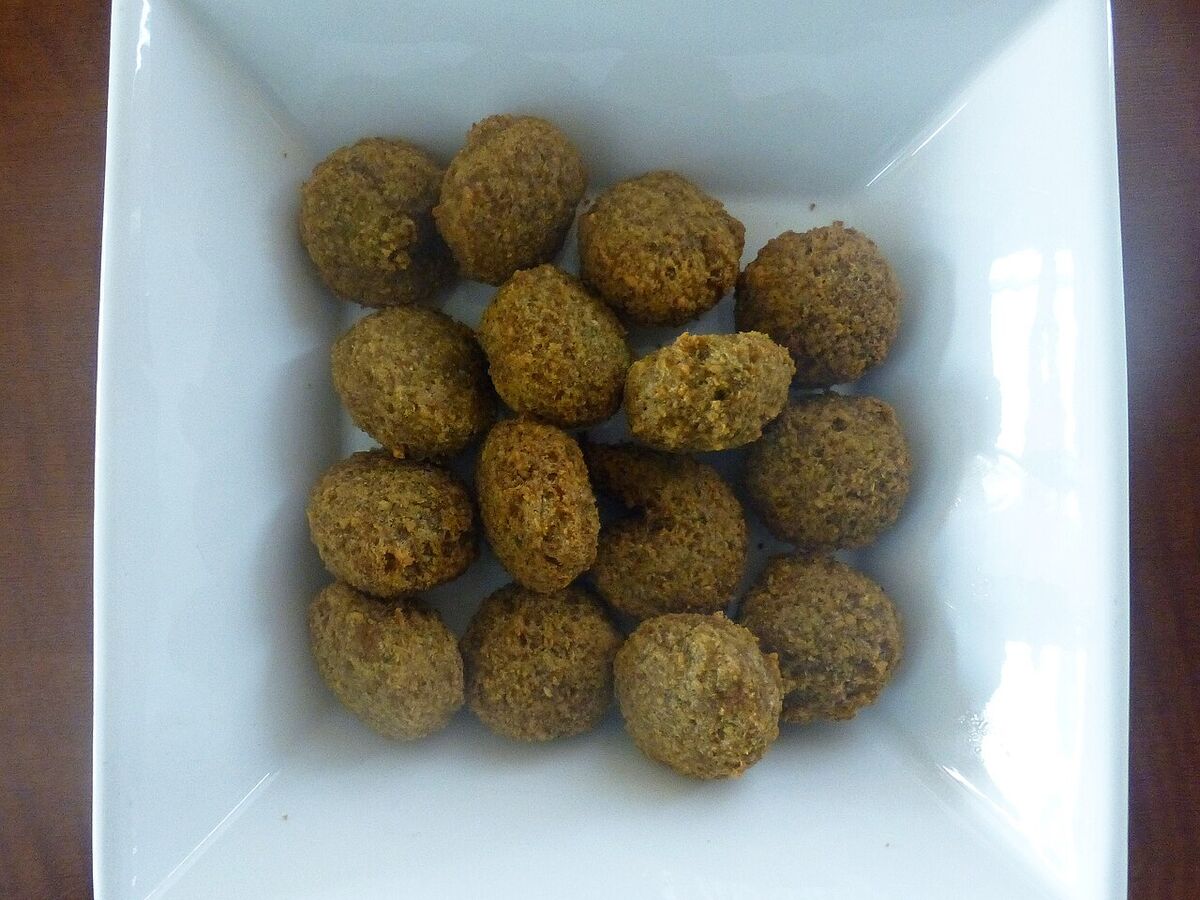A bowl of freshly fried falafel.